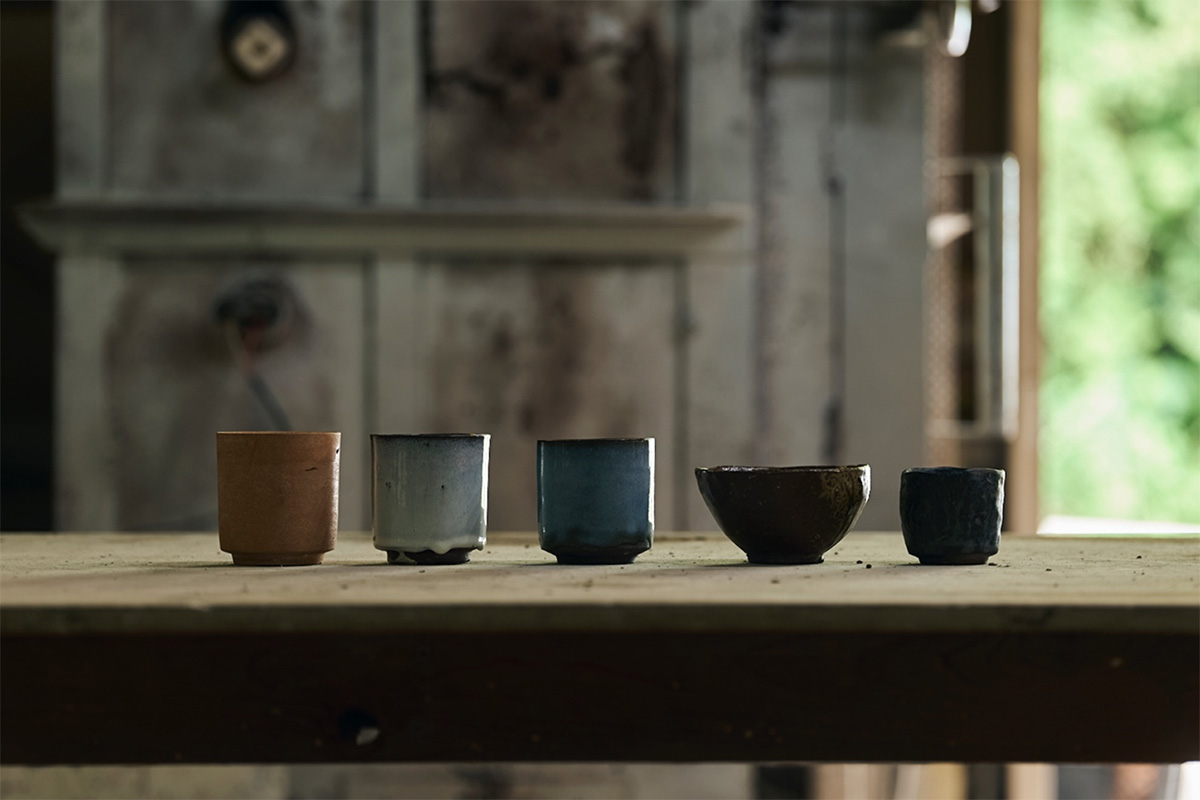 Ceramic art experience with a choice of four glazes: white, light blue, black, and brown.